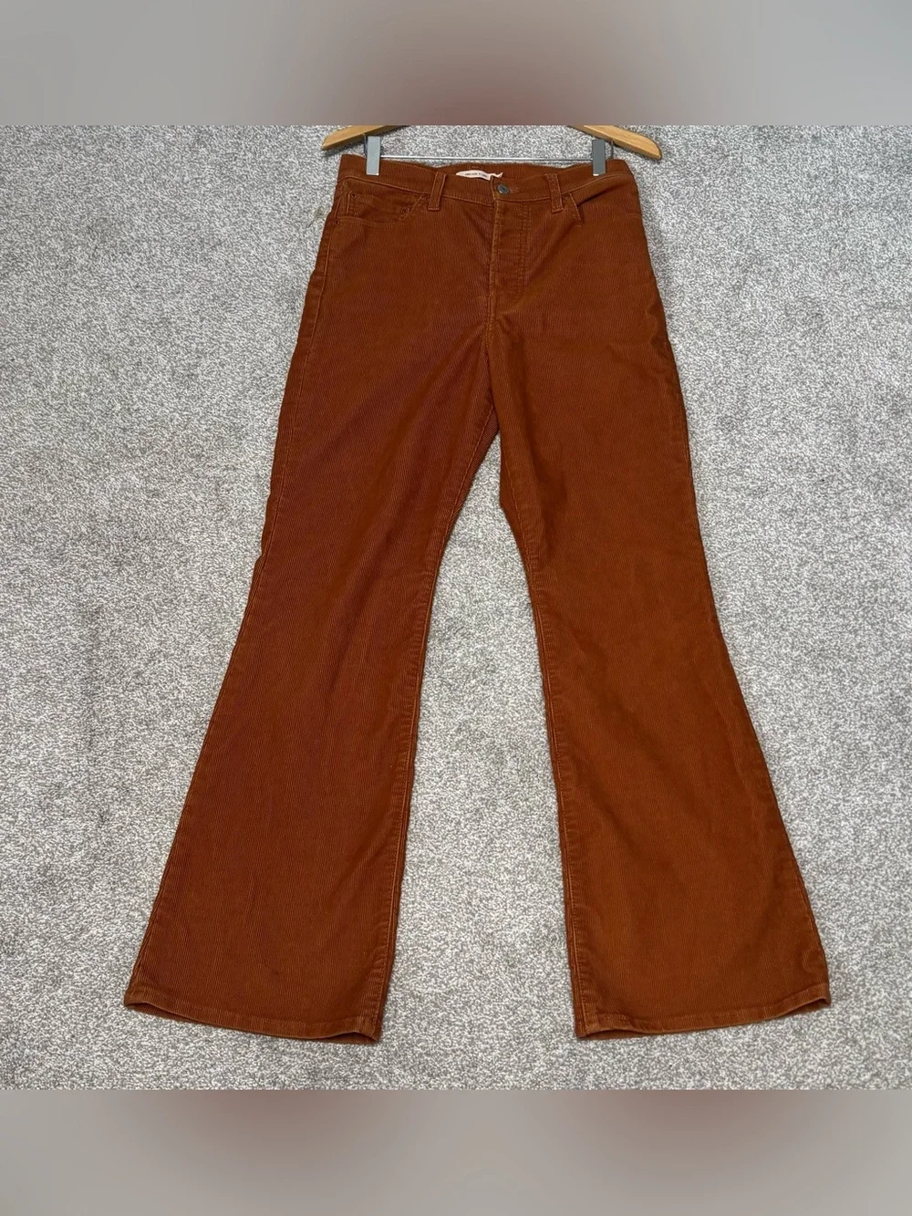 Levi’s Women’s Ribcage Flare Rust Orange Corduroy High Rise Pants Size 28